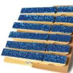 Glittered clothes pins . la..